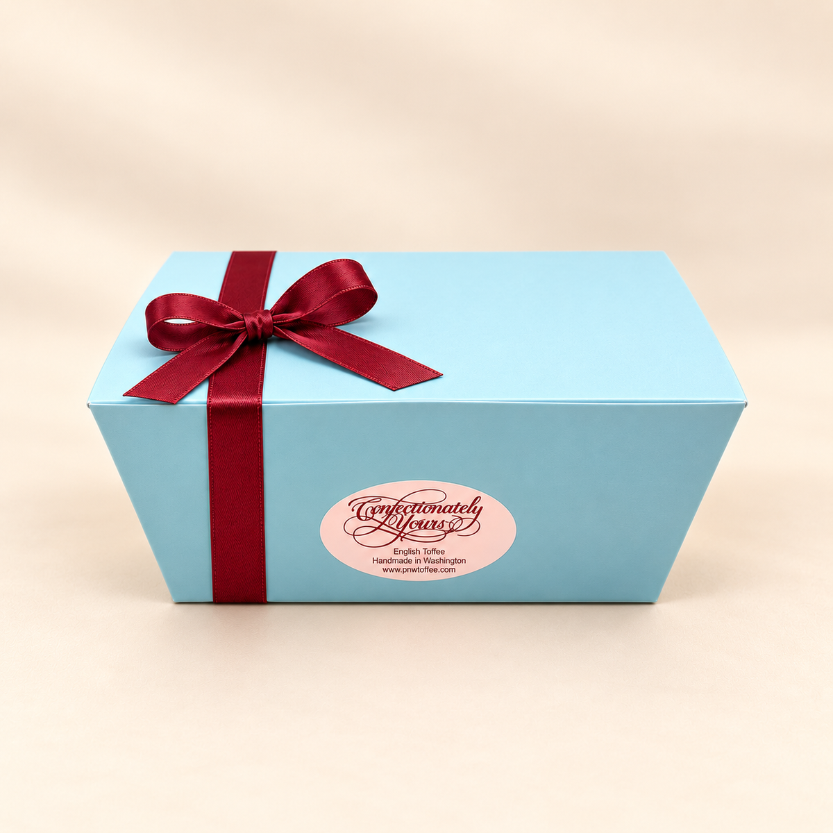 Confectionately Yours English toffee in custom blue box with red bows - special request for corporate gifts